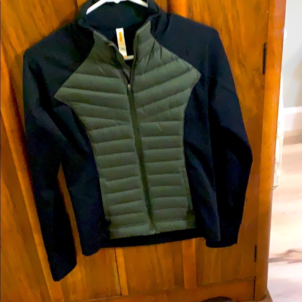 Lucy Black and green front zip jacket.